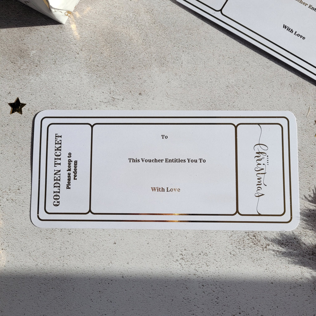 Blank Christmas golden ticket gift voucher in gold foil